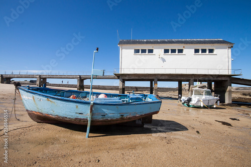 Canvas-taulu Boat and boathouse
