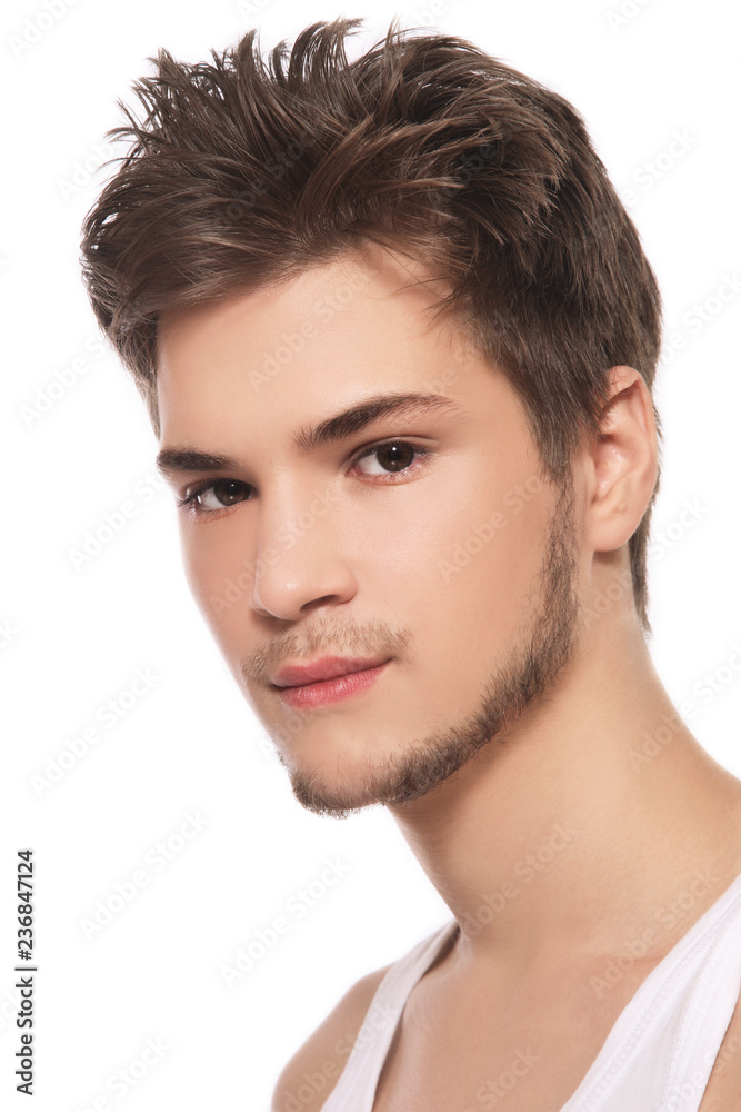 Portrait of young handsome man with messy hairstyle Portrait of young handsome man with messy hairstyle