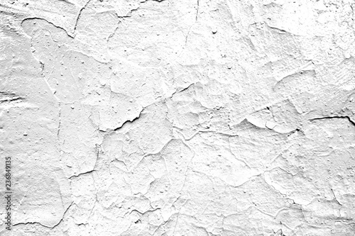 Texture of old white cracked wall. The effect of antiquity.