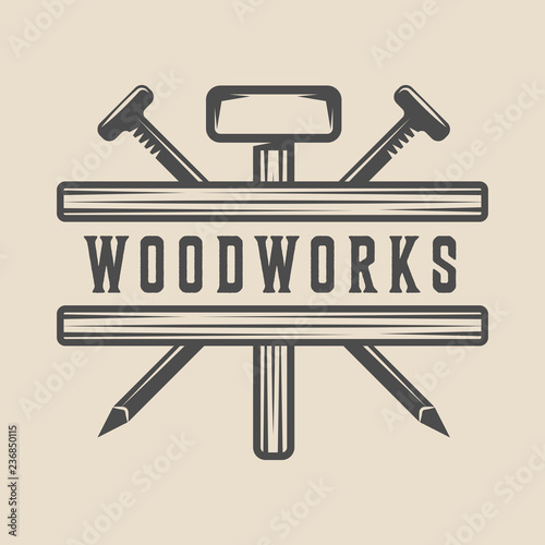 Vintage carpentry, woodwork and mechanic label, badge, emblem and logo. Vector illustration. Monochrome Graphic Art.