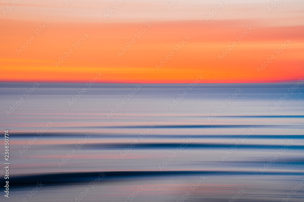 Orange sunset with waves