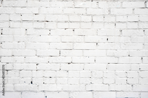 Texture. Background white cracked brick wall.