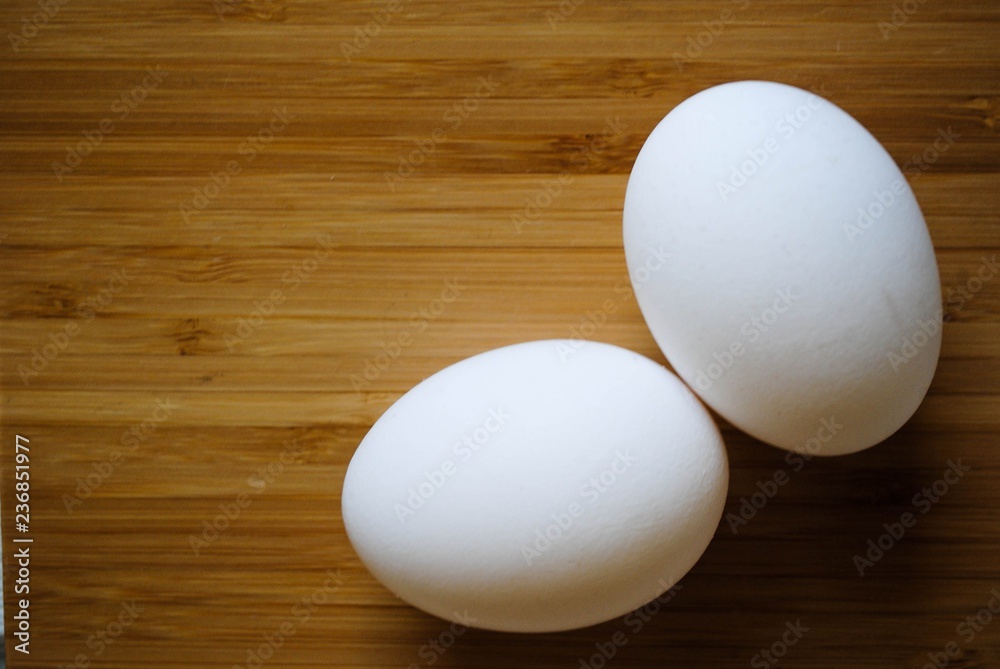 Chicken white eggs close-up on the table Chicken white eggs close-up on the table