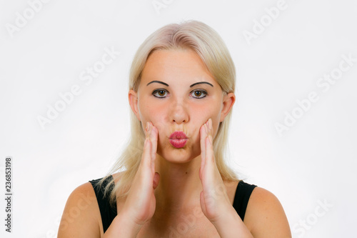 Face exercise for women fuller cheeks