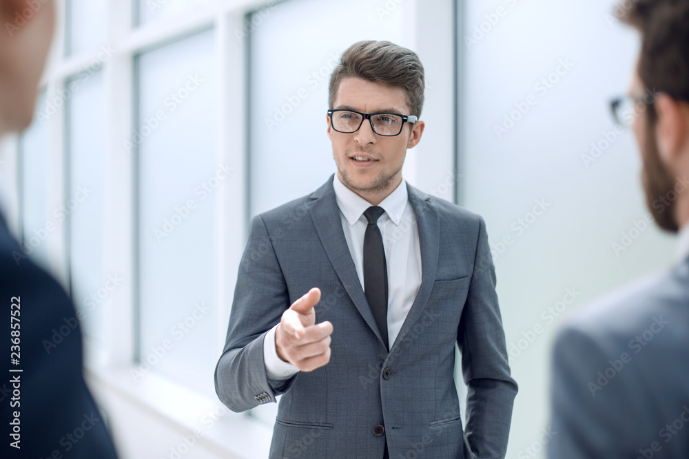 boss is discussing something with his employees boss is discussing something with his employees