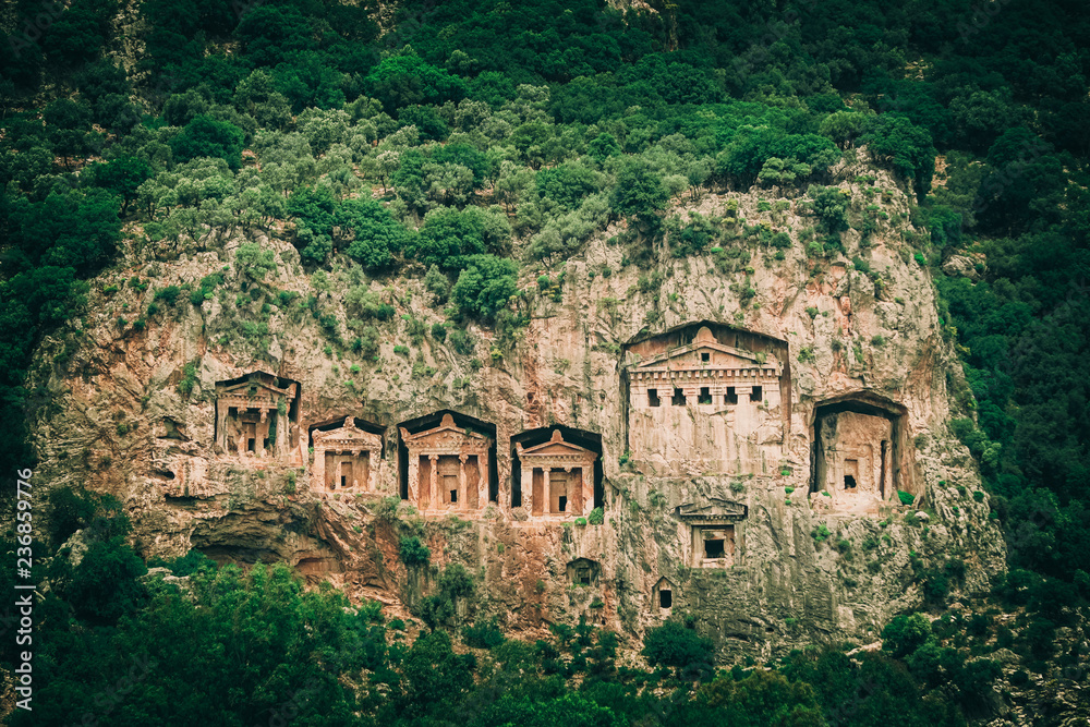 Lycian Rock Tombs of Dalyan, Mugla, Turkey. Tombs near the Caunus (Kaunos) Ancient City. Lycian Rock Tombs of Dalyan, Mugla, Turkey. Tombs near the Caunus (Kaunos) Ancient City.