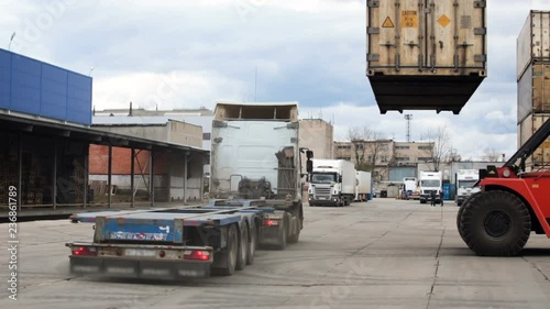 Truck without bodywork. The truck moves around the warehouse photo