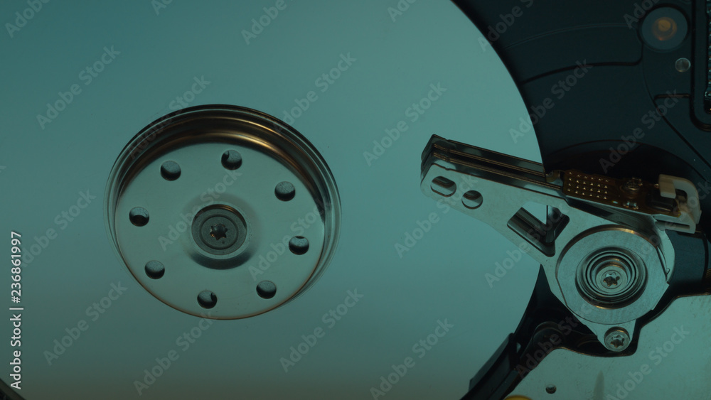Hdd. open hard disk drive. The concept of data storage. data array. hard drive from the computer. hdd with mirror effect Hdd. open hard disk drive. The concept of data storage. data array. hard drive from the computer. hdd with mirror effect