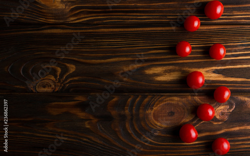 Top view of Cherry tomatoes on wooden table