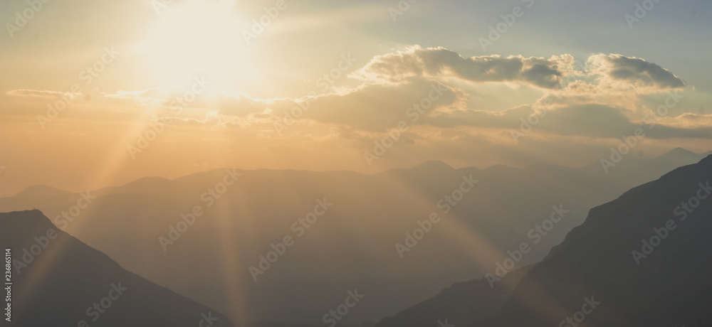 beautiful morning sun rise mountain silhouettes nature panorama landscape 