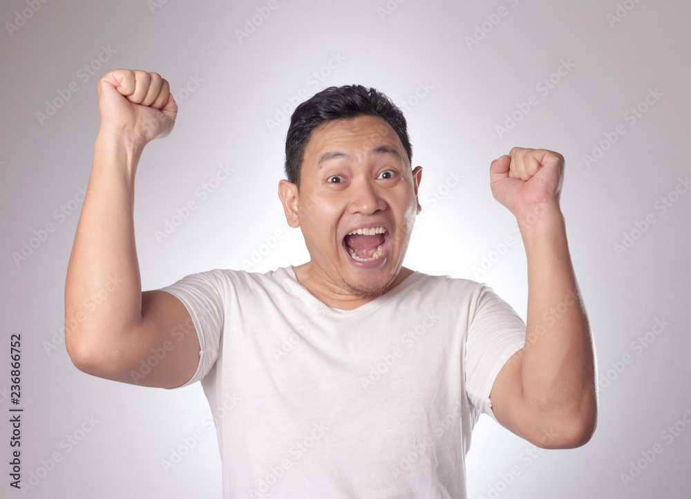 Fototapeta premium Surprised Happy Asian Man