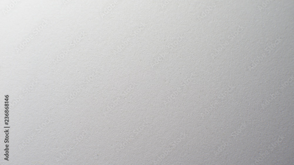White artificial foam, foam texture on a light background. White artificial foam, foam texture on a light background.