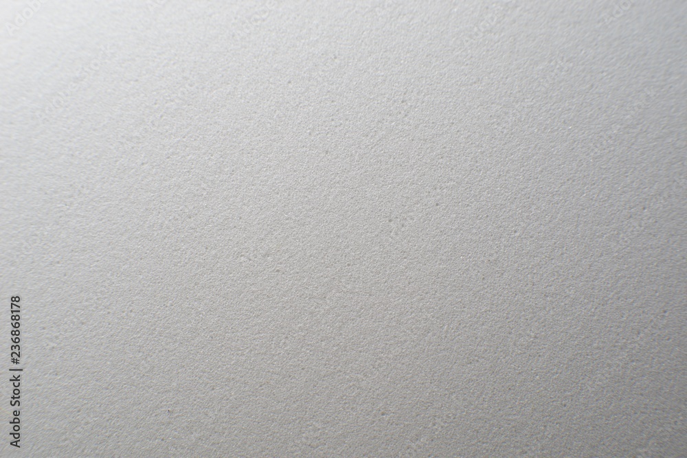 White artificial foam, foam texture on a light background. White artificial foam, foam texture on a light background.