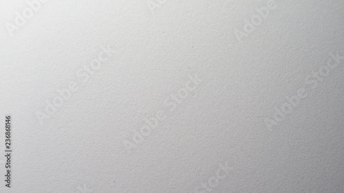 White artificial foam, foam texture on a light background.