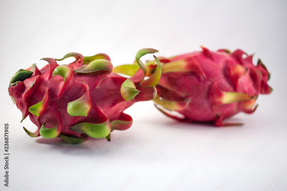 Two dragon fruits isolated on white background Two dragon fruits isolated on white background