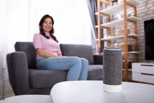 Close-up Of Wireless Speaker On Furniture