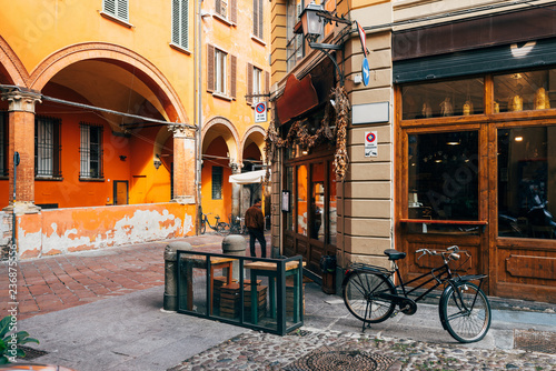 Fototapeta Naklejka Na Ścianę i Meble -  Old narrow street in Bologna, Emilia Romagna, Italy