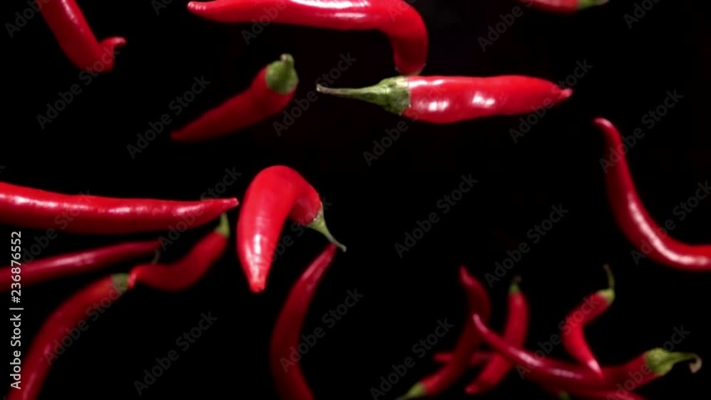 Falling of red pepper. Slow motion 480 fps Falling of red pepper. Slow motion 480 fps