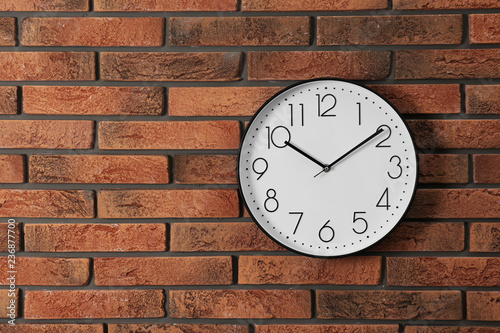 Wallpaper Mural Stylish analog clock hanging on brick wall. Space for text Torontodigital.ca
