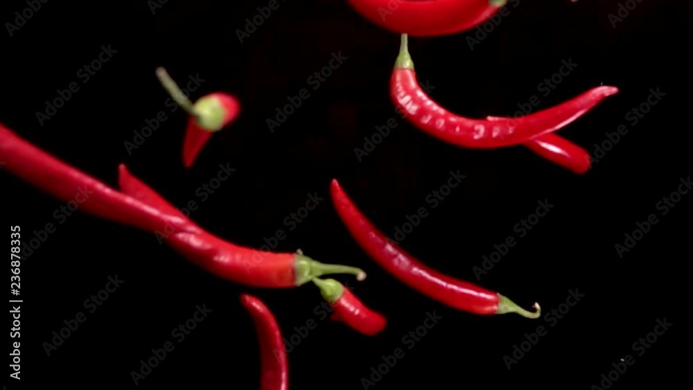 Falling of red pepper. Slow motion 480 fps