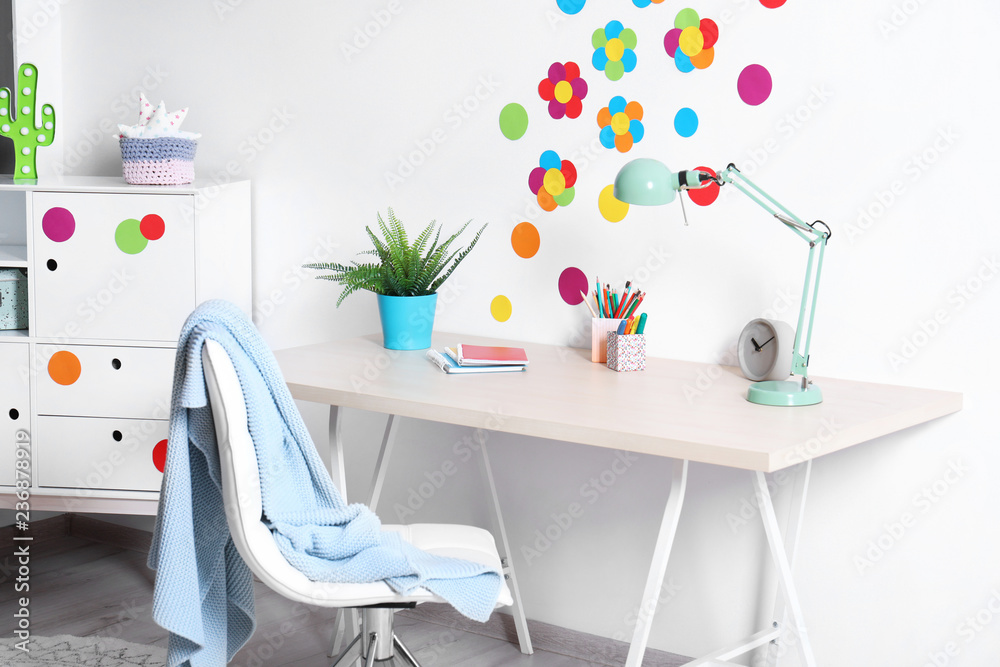 Fototapeta premium Modern child room interior with study station