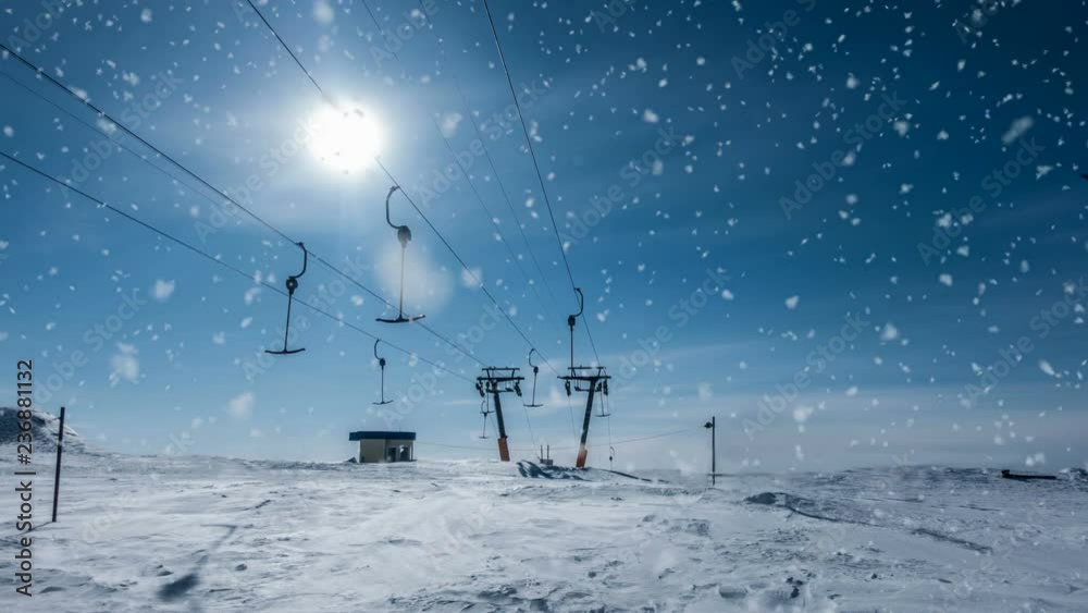 Soft snow falls on the top of the ski base, a beautiful winter landscape, video loop Soft snow falls on the top of the ski base, a beautiful winter landscape, video loop