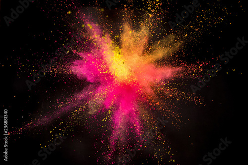 Colored powder explosion on black background. © Lukas Gojda