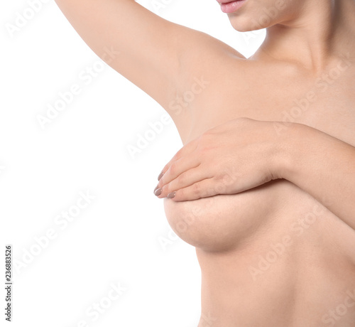 Woman covering her breast on white background, space for text. Self examination