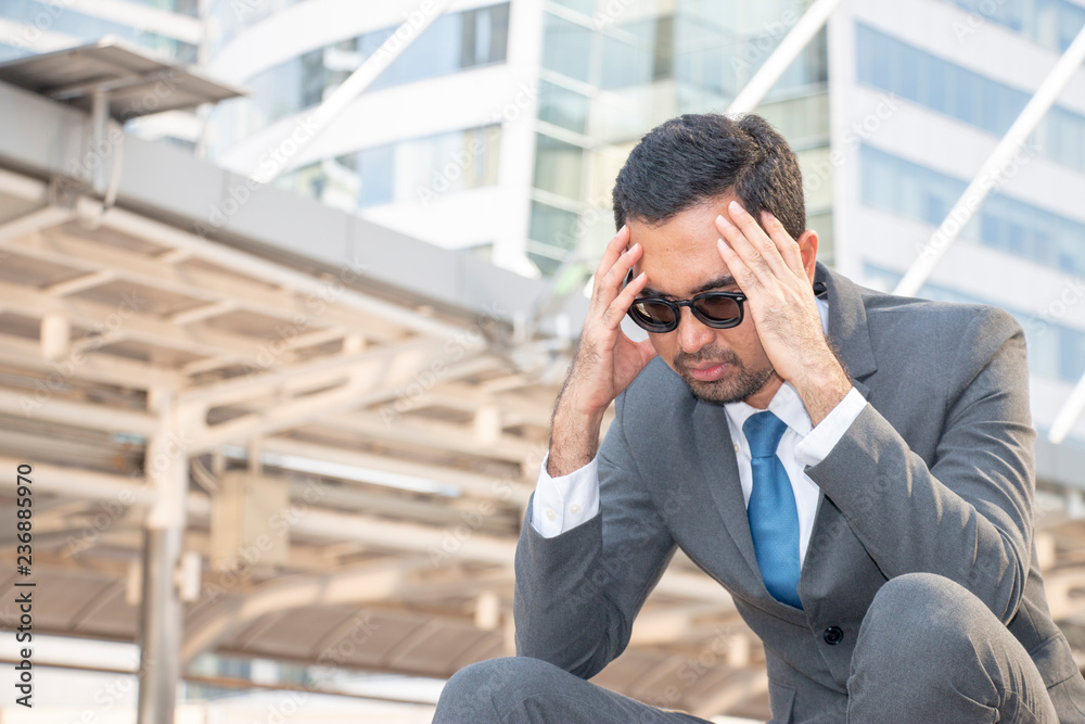 Businessman is having a trouble. He has problem and feel headache. Businessman is having a trouble. He has problem and feel headache.