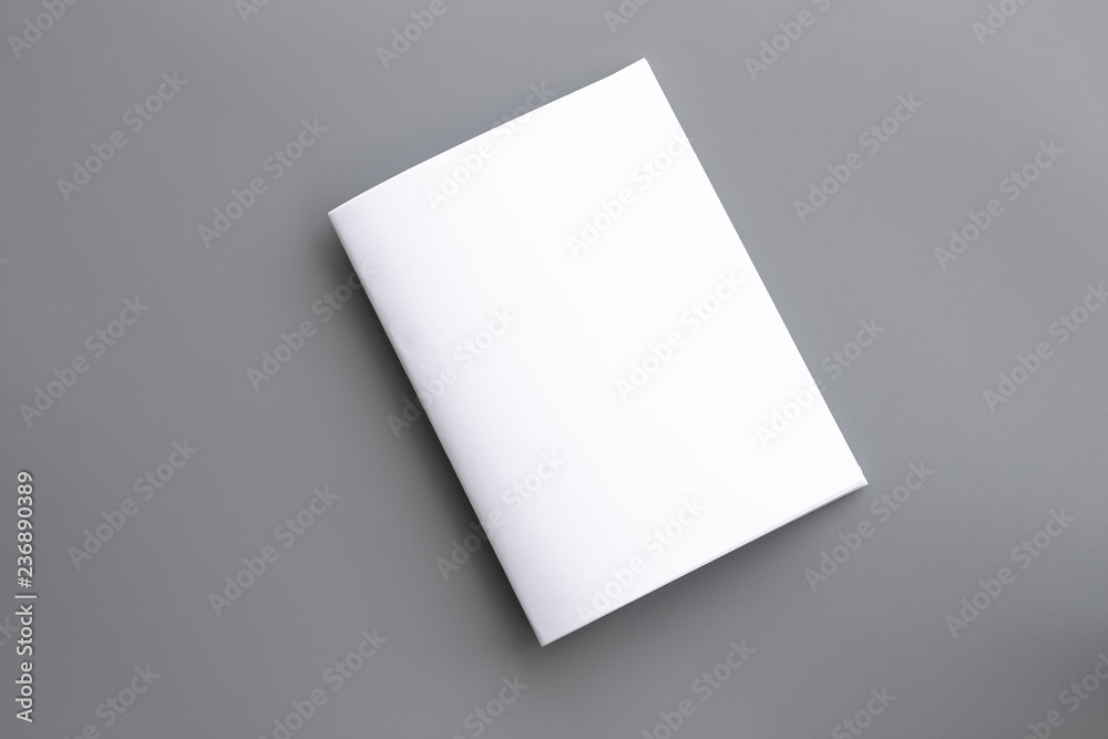 Blank portrait mock-up paper. brochure magazine isolated on gray, changeable background / white paper isolated on gray Blank portrait mock-up paper. brochure magazine isolated on gray, changeable background / white paper isolated on gray