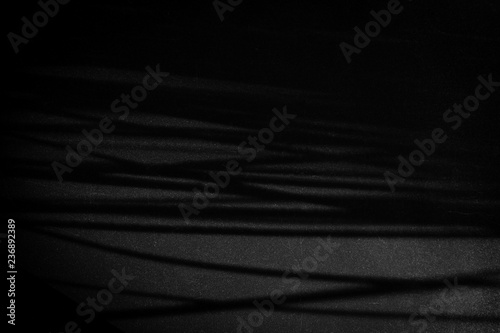 black texture or background with spotlight, dark wall backdrop wallpaper, dark tone.