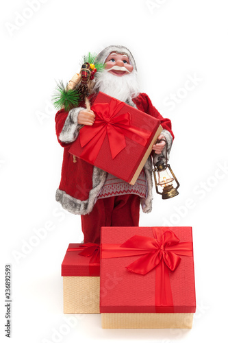 Santa Claus with gift box isolated on white background. Christmas and new year concept.