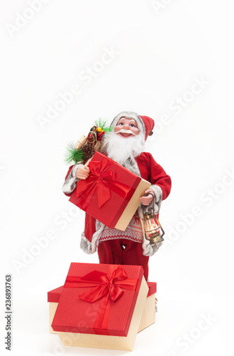 Santa Claus with gift box isolated on white background. Christmas and new year concept.