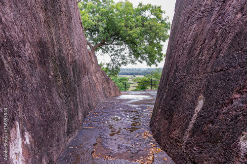 Awesome snap of  rock pathway at budhhiest stone hills, build by cut the rock for visit to budhha temple at sankaram village of visakhapatnam district of india, . photo