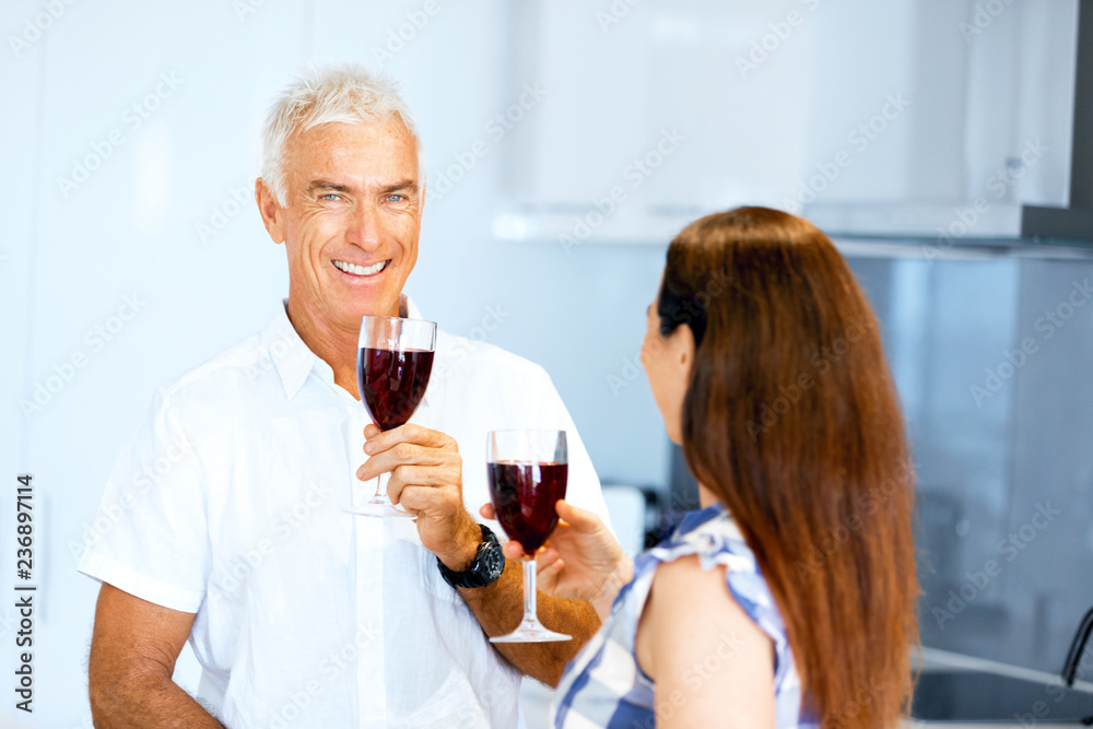 Portrait of a couple having a glass of red wine Portrait of a couple having a glass of red wine