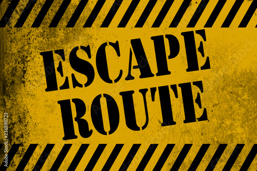 Escape route sign yellow with stripes