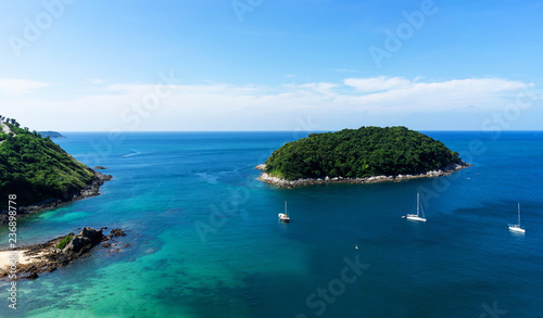 View on ocean with yacht from mountains at Promthep cape area on Phuket island