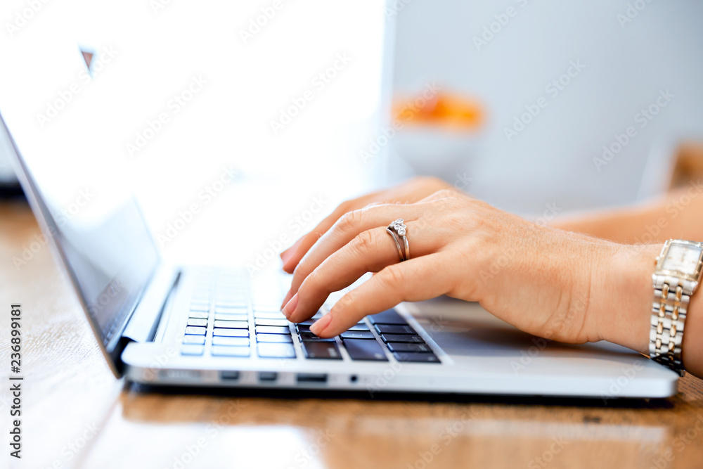Mature beautiful woman working on her laptop Mature beautiful woman working on her laptop