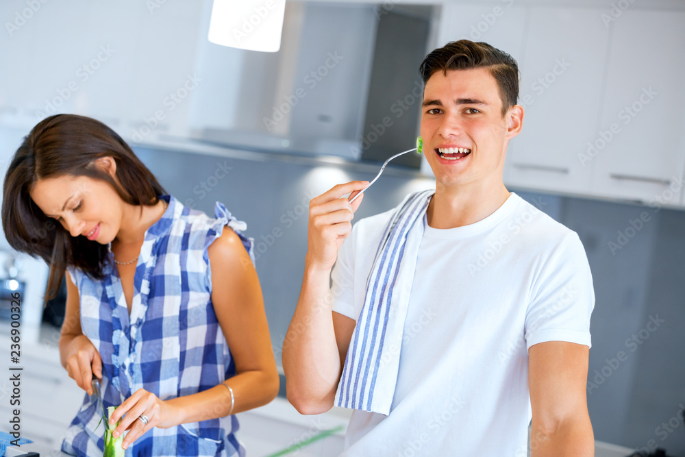 Obraz premium Young man with a fork