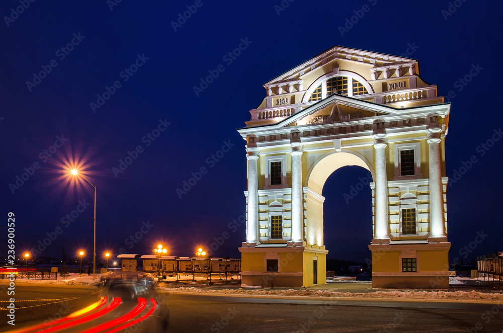 Fototapeta premium IRKUTSK, RUSSIA - November 10, 2012. Triumphal Arch Moscow Gates is located on Angara river embarkment in the center of city. Completed in 1813. dismantled in 1925. Recreated in 2011.