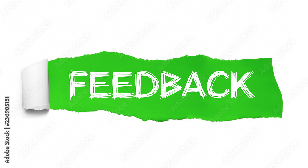 The word feedback appearing behind torn green paper The word feedback appearing behind torn green paper