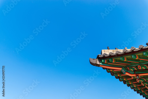 Close up of detail of Traditional Korean Roof (Colourful Decorated Ornament for Ancient Korean Palace) at Changdeokgung Palace, Seoul, South Korea