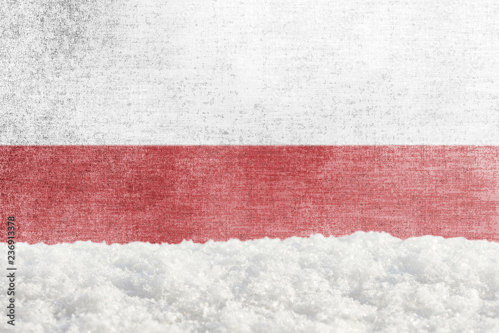 Winter grunge background with snowdrift and Polish flag in the backdrop