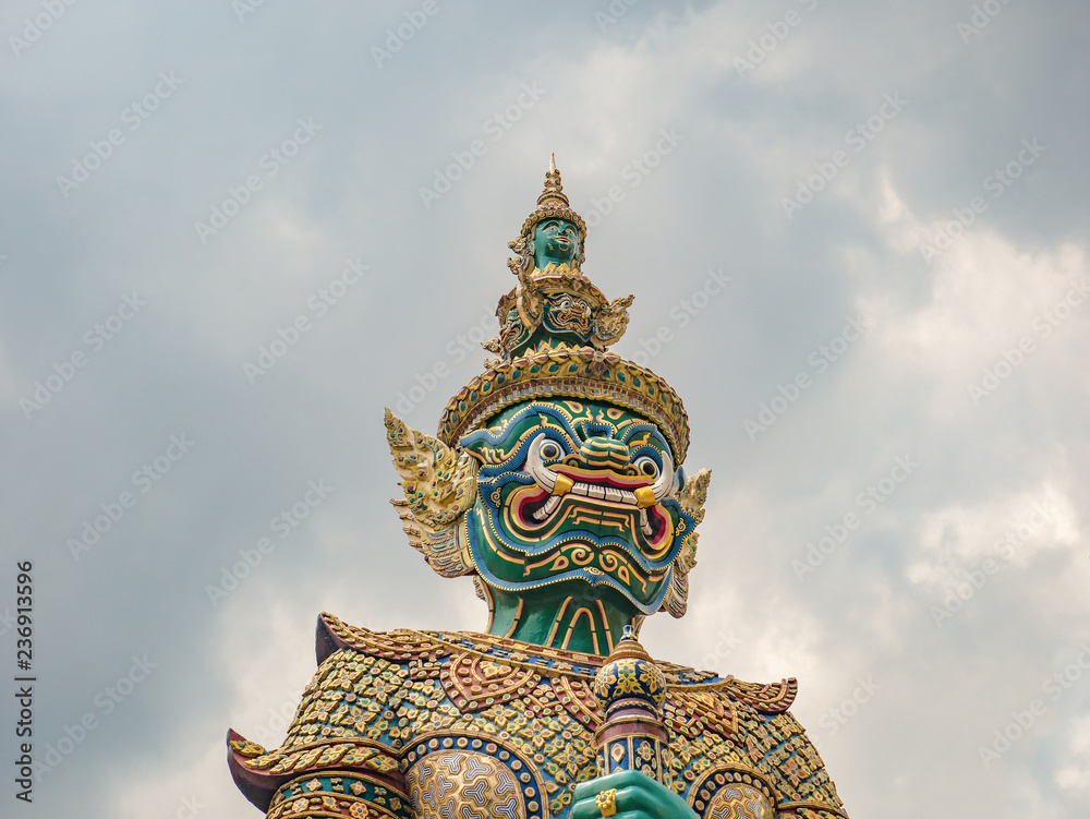 Giant The front of gate with Cloud sky in Wat phrakaew Temple Bangkok city thialand