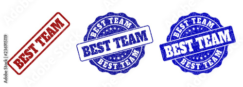 BEST TEAM grunge stamp seals in red and blue colors. Vector BEST TEAM marks with scratced effect. Graphic elements are rounded rectangles, rosettes, circles and text captions.