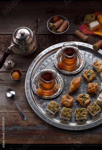 Oriental tea with baklava and sweets, copy space