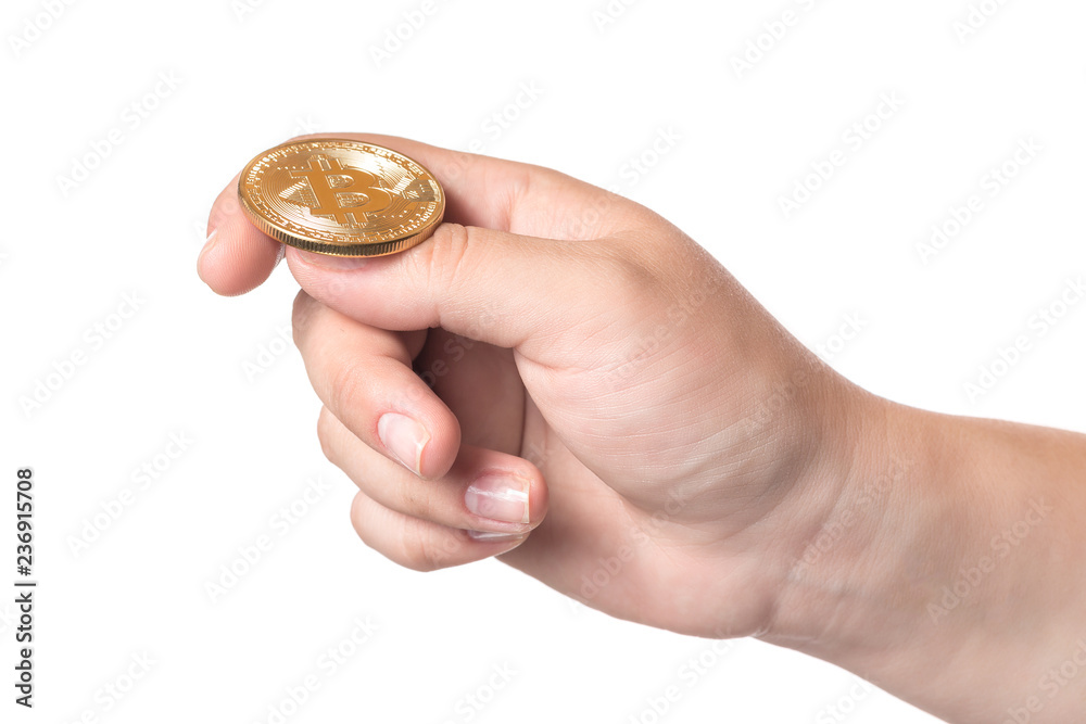 Female hand holding bitcoin symbol of crypto currency electronic virtual money for web banking and international network payment. Isolated on white Female hand holding bitcoin symbol of crypto currency electronic virtual money for web banking and international network payment. Isolated on white