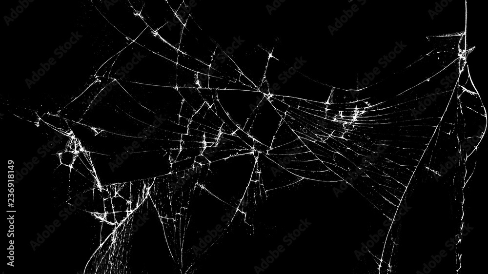 Texture of broken glass on a black background. Concept of broken automotive glass, screen phone, tablet, laptop. Flat lay, top view