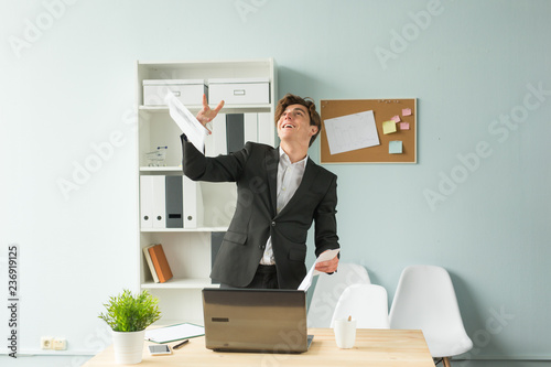 Fotografie Business, humor and people concept - Handsome and young man in suit throws up sh