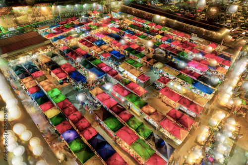 Bird eyes view of Multi-colored tents /Sales of second-hand market at twilight.